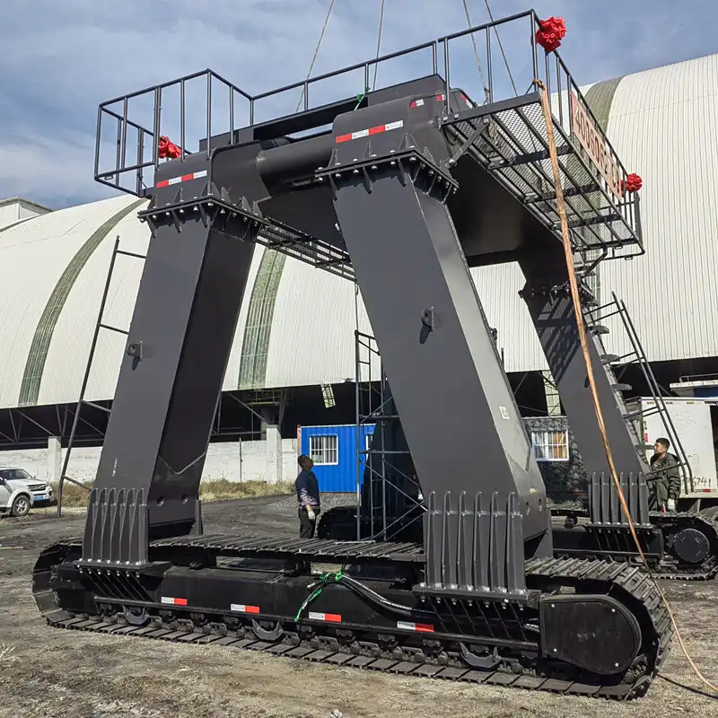 What is the purpose of an excavator straddle carrier?